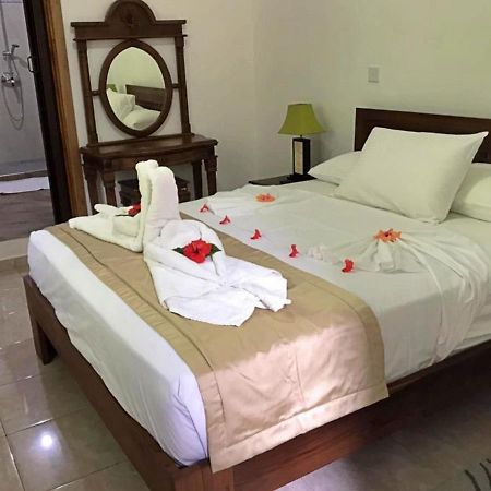 Acquario Guesthouse Anse Volbert Village Buitenkant foto