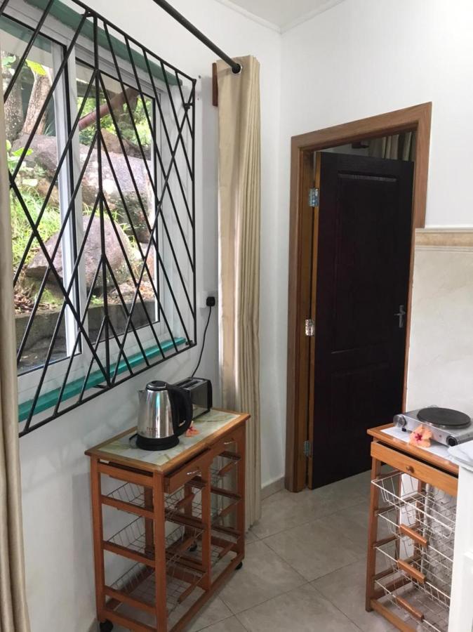Acquario Guesthouse Anse Volbert Village Buitenkant foto