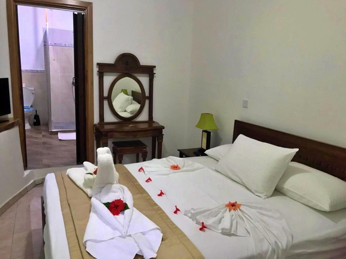 Acquario Guesthouse Anse Volbert Village Buitenkant foto