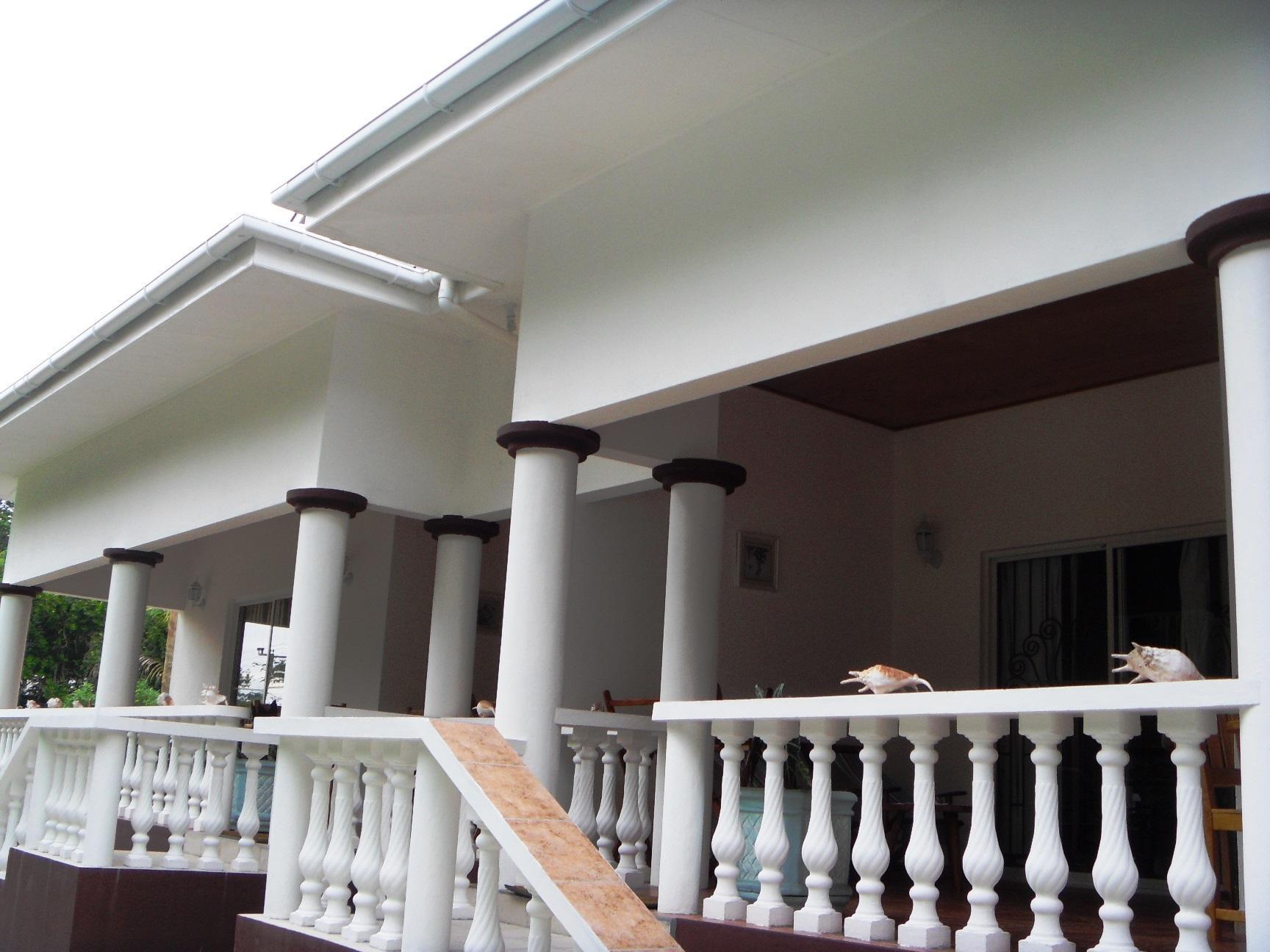 Acquario Guesthouse Anse Volbert Village Buitenkant foto