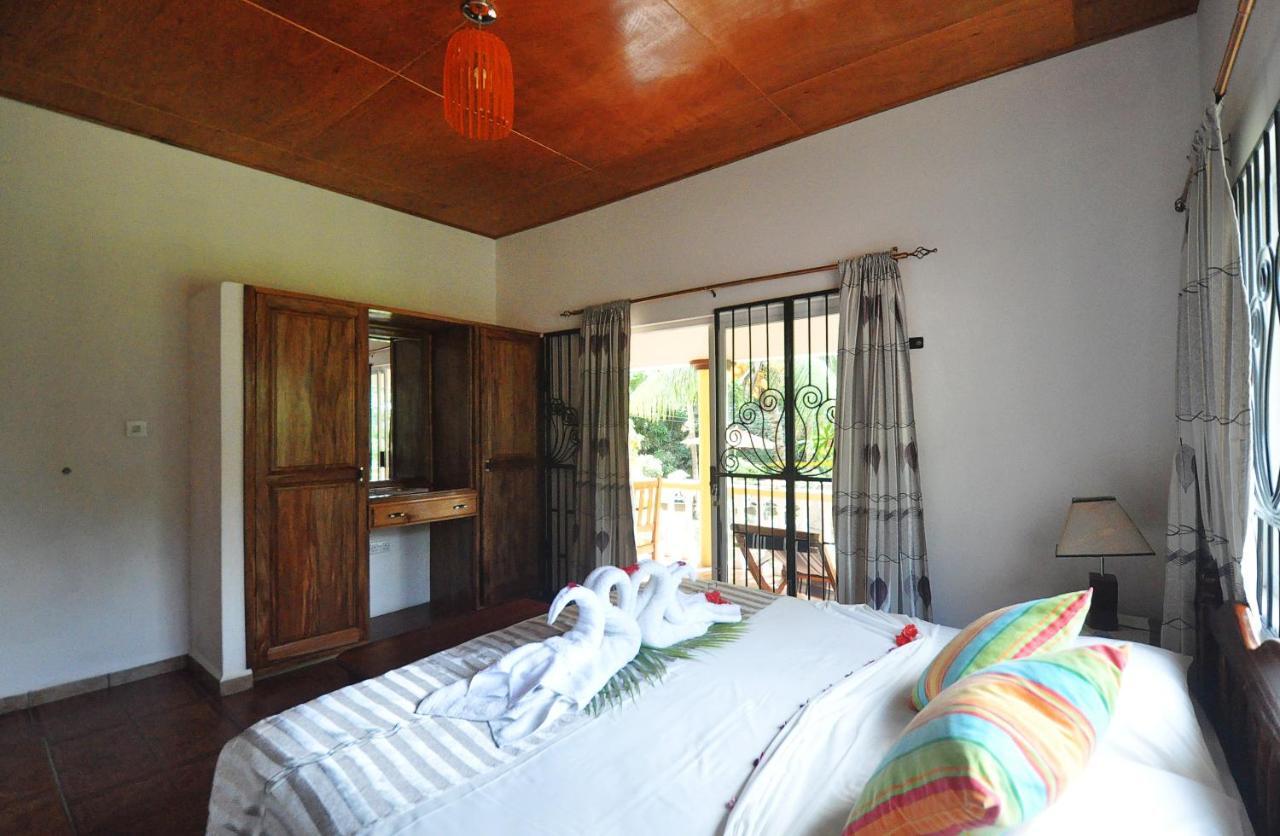 Acquario Guesthouse Anse Volbert Village Buitenkant foto