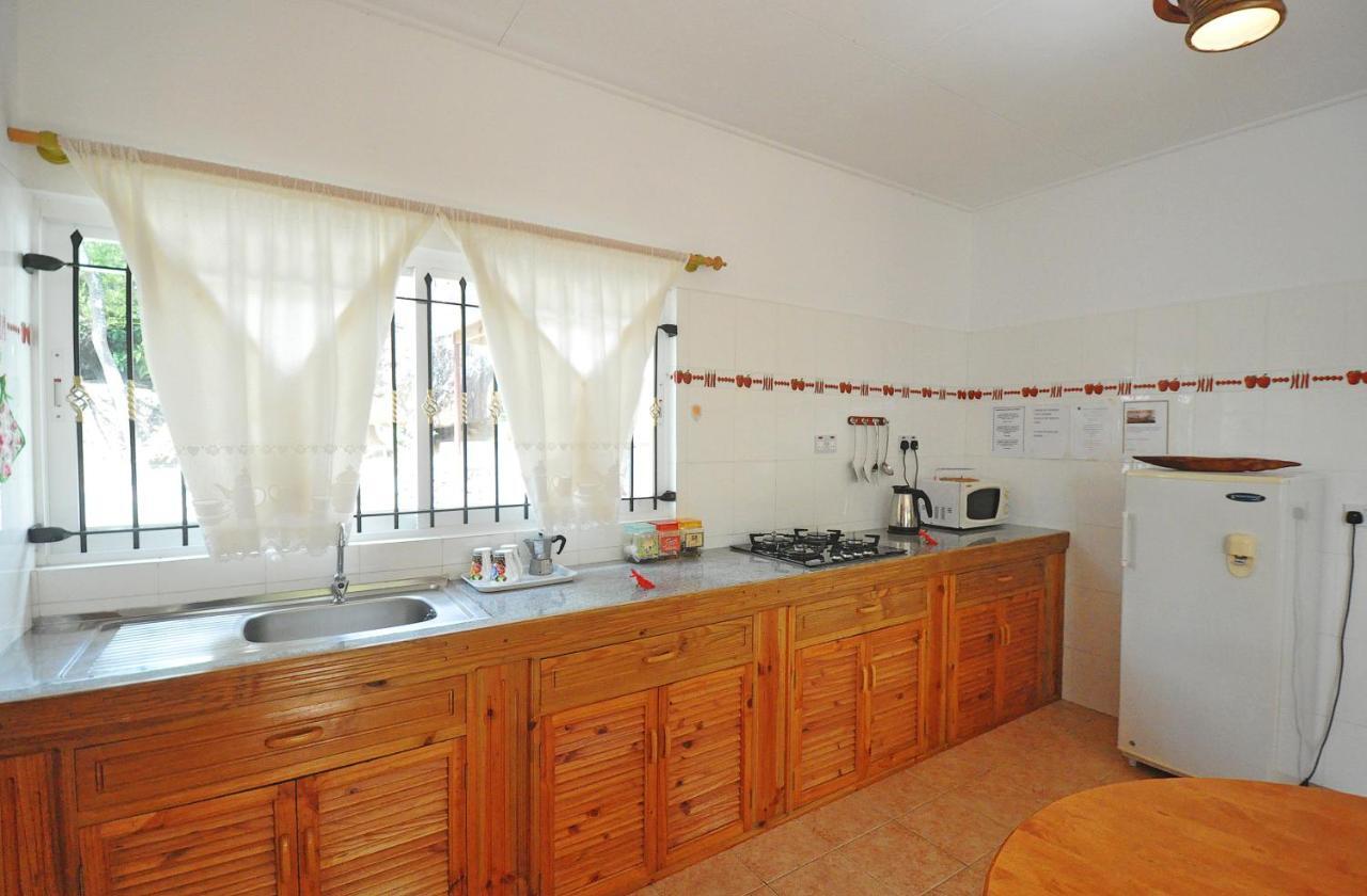 Acquario Guesthouse Anse Volbert Village Buitenkant foto